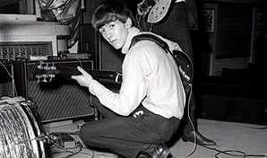 George checking his guitar setup